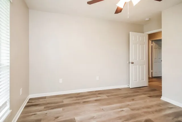 an empty room with a natural light