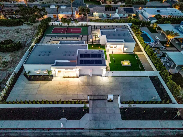 a view of a swimming pool with lounge chair