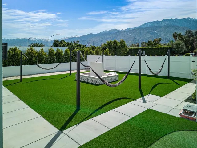 a view of a yard with an outdoor space