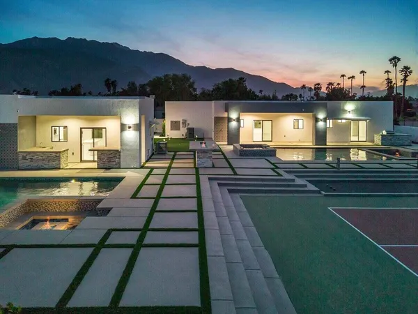 a view of a swimming pool with a patio