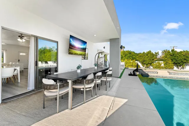 a bathroom with a double vanity sink a mirror and a