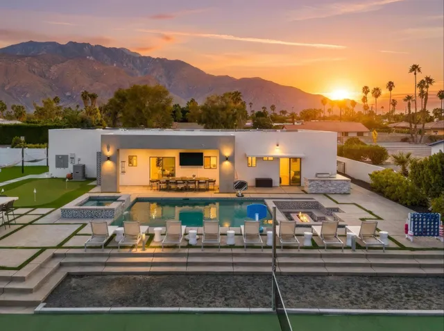 a bathroom with a shower and toilet