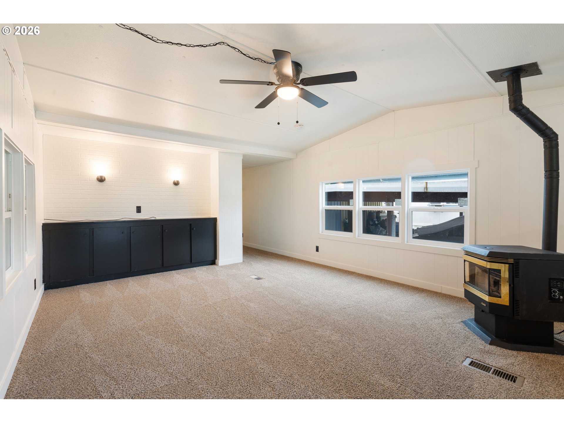 15130 South Maplelane Road, Unit 50 Oregon City, OR 97045 - Photo 16 of 36 a view of an empty room with a window