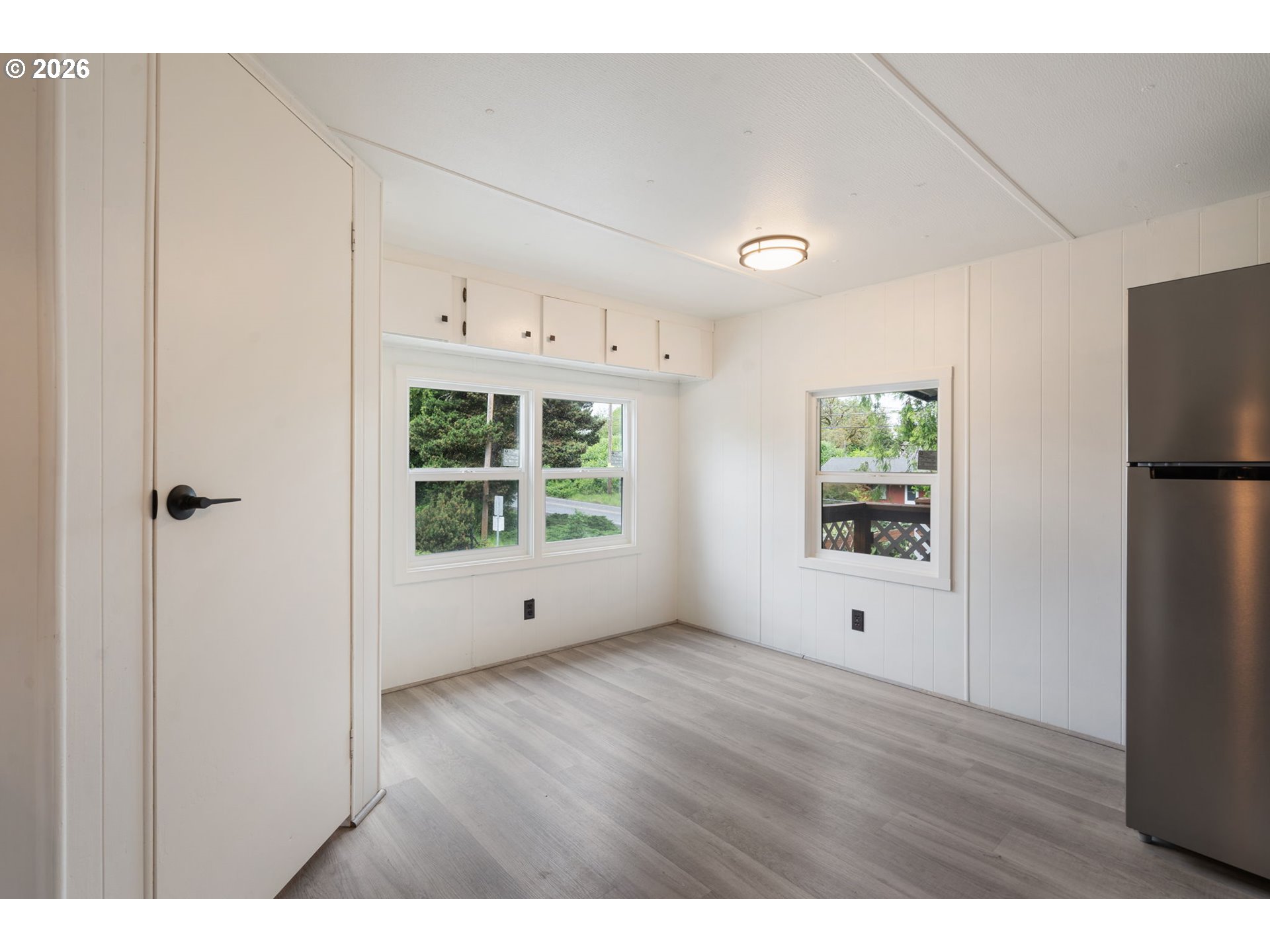 15130 South Maplelane Road, Unit 50 Oregon City, OR 97045 - Photo 17 of 36 a view of an empty room with a window