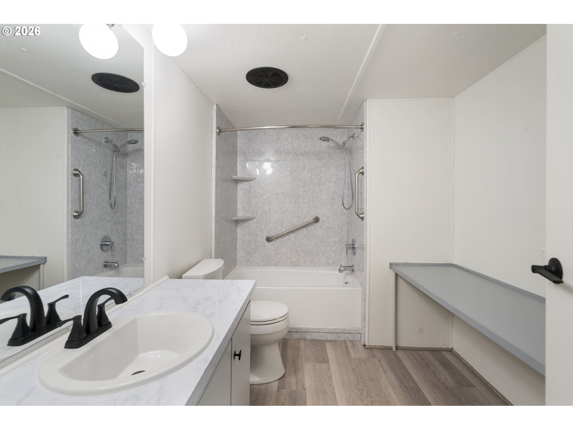 15130 South Maplelane Road, Unit 50 Oregon City, OR 97045 - Photo 22 of 36 a bathroom with a sink a toilet and shower