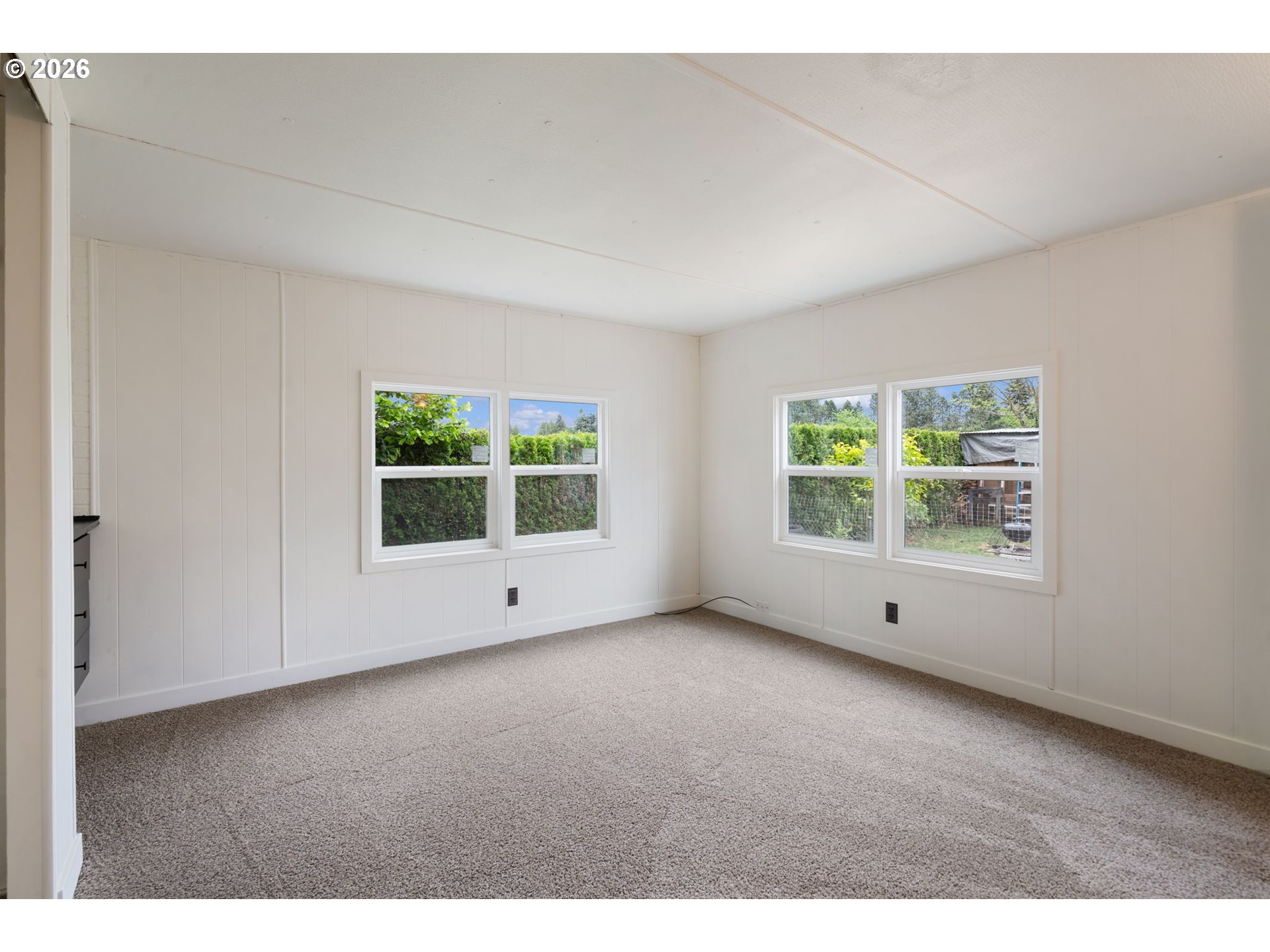 15130 South Maplelane Road, Unit 50 Oregon City, OR 97045 - Photo 26 of 36 a view of an empty room with a window