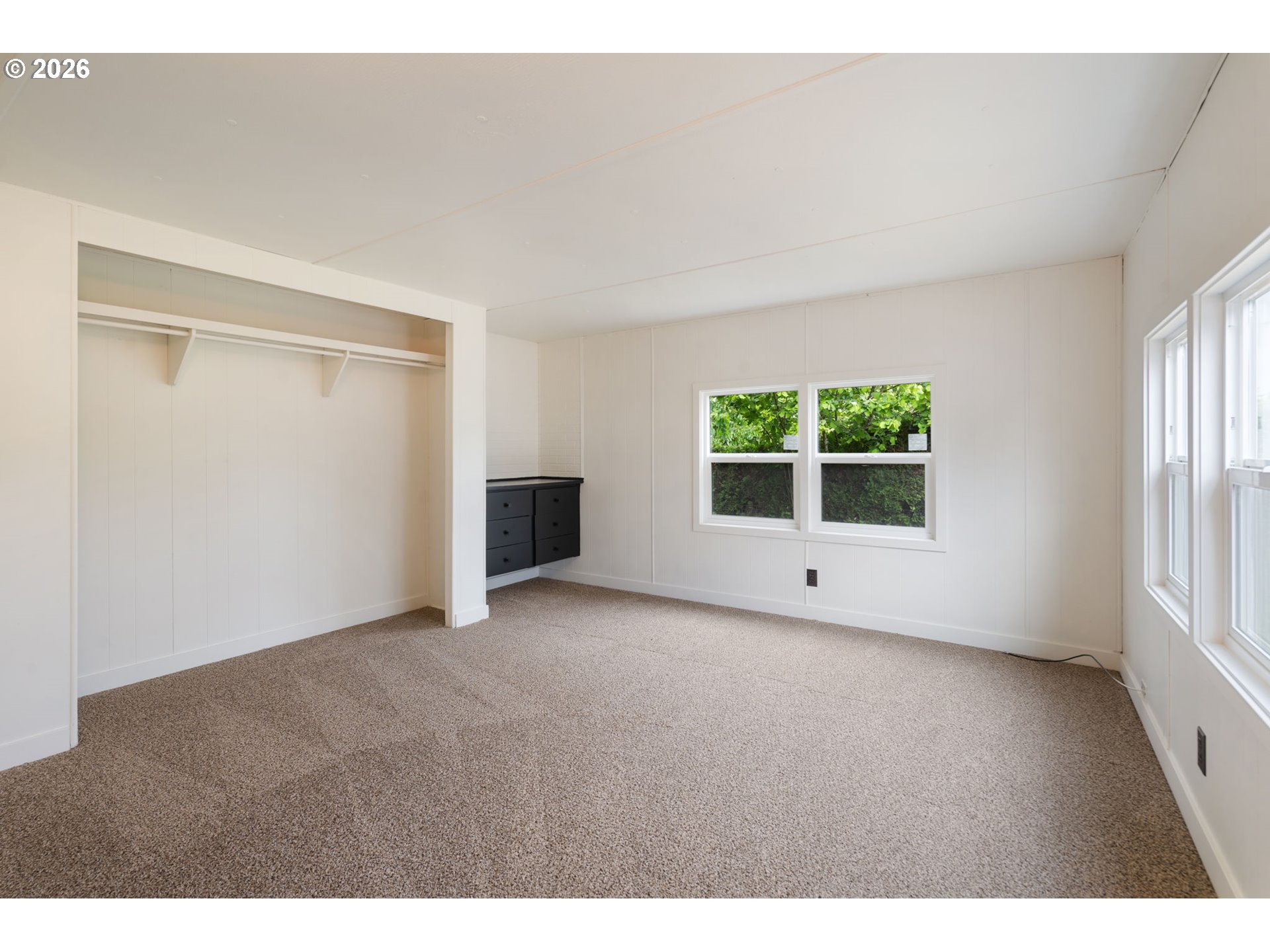 15130 South Maplelane Road, Unit 50 Oregon City, OR 97045 - Photo 27 of 36 a view of an empty room with a window