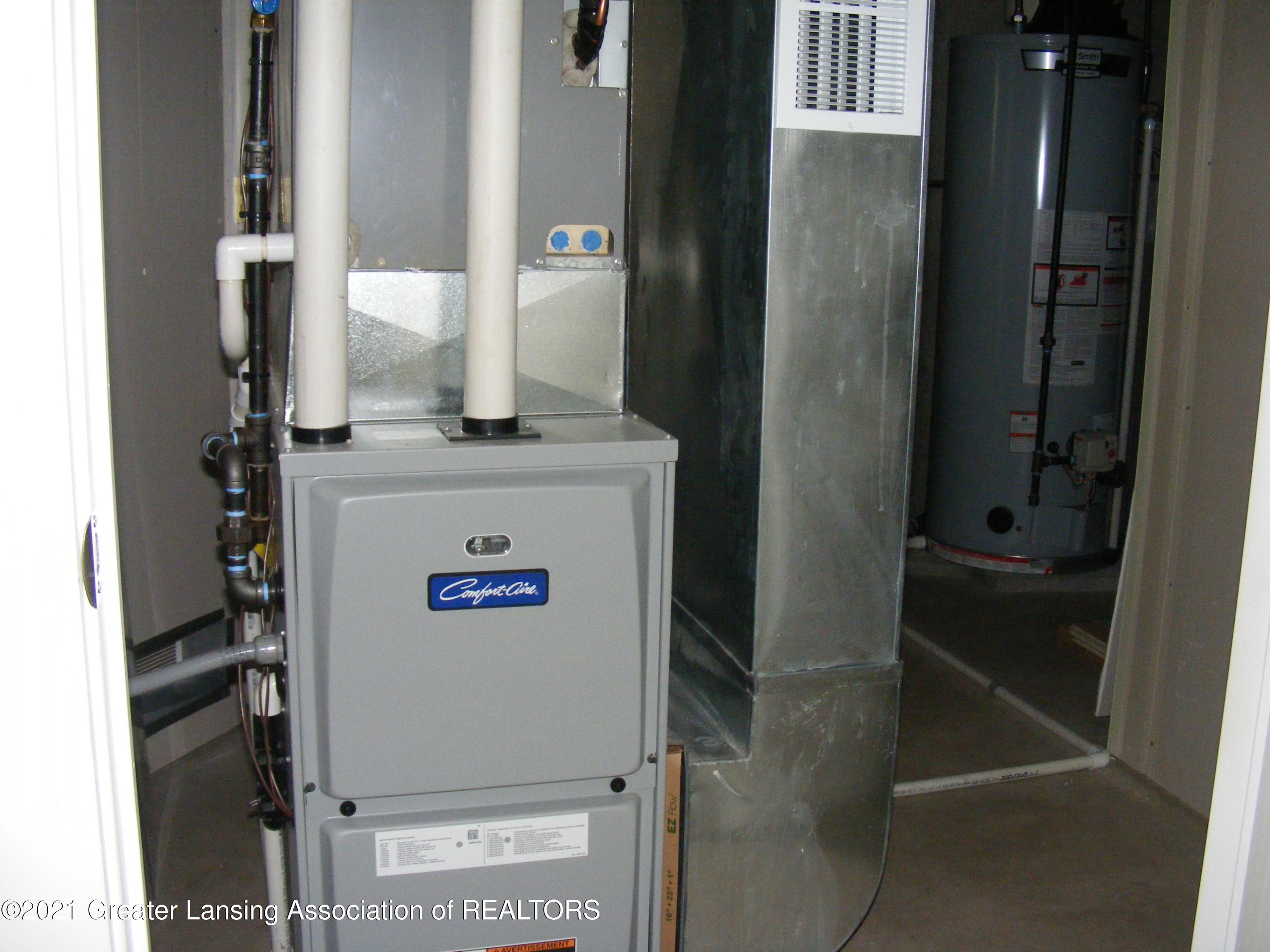 2430 South Meridian Road Ovid, MI 48866 - Photo 22 of 36 basement furnace, utility room