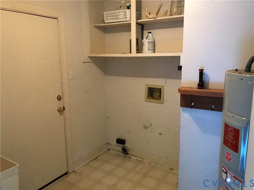 2395 State Rte 635 Midlothian, VA 23113 - Photo 11 of 38 a bathroom with a sink and a mirror