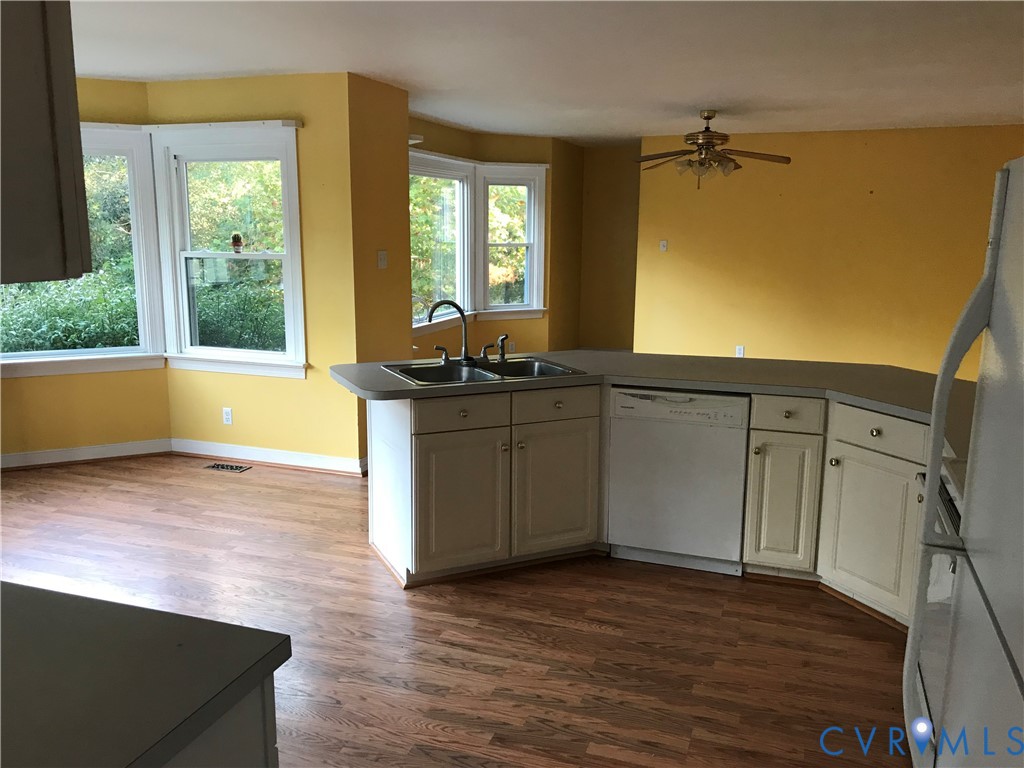 2395 State Rte 635 Midlothian, VA 23113 - Photo 17 of 38 a kitchen with a sink cabinets and wooden floor