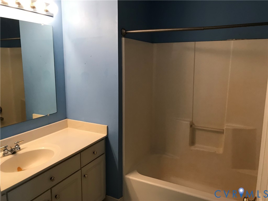 2395 State Rte 635 Midlothian, VA 23113 - Photo 22 of 38 a bathroom with a shower and a sink