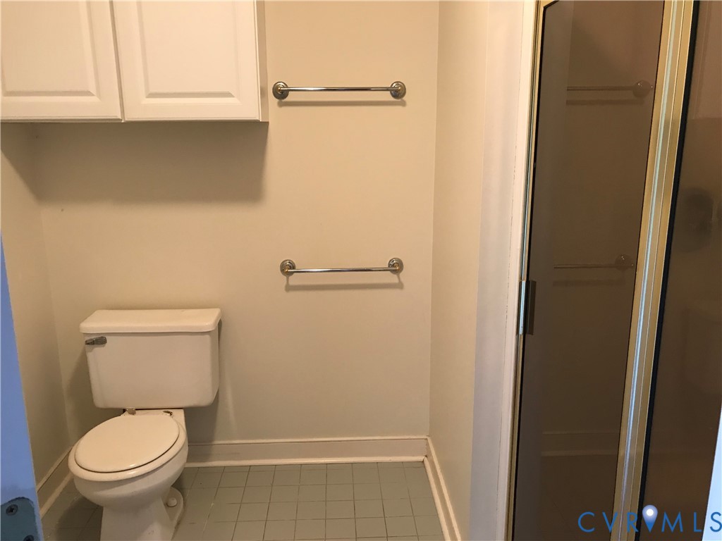 2395 State Rte 635 Midlothian, VA 23113 - Photo 29 of 38 a white toilet sitting next to a shower