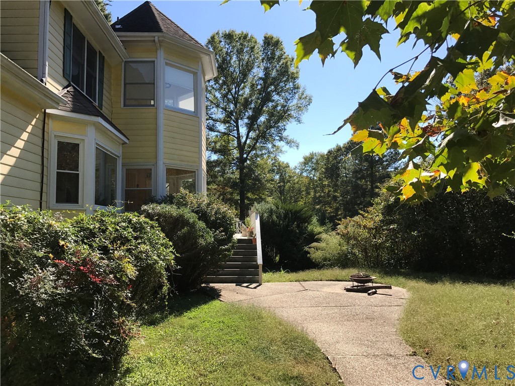 2395 State Rte 635 Midlothian, VA 23113 - Photo 5 of 38 front view of a house with a yard