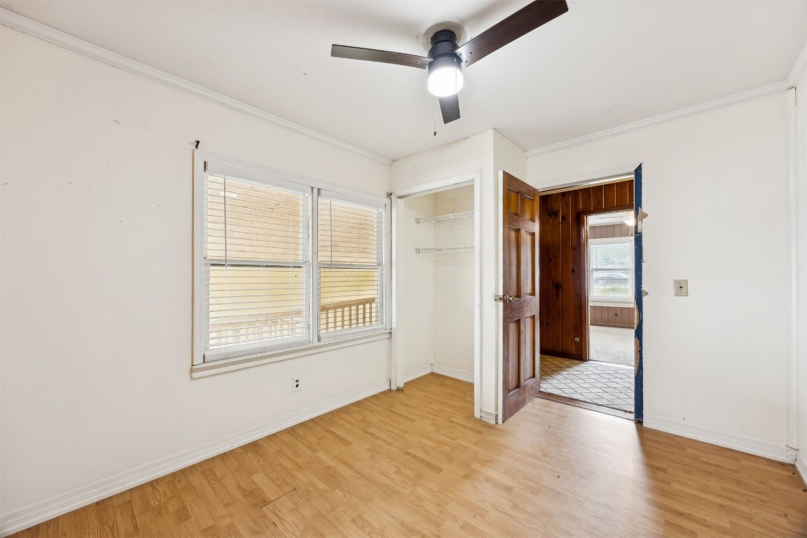463465 State Road 200 Yulee, FL 32097 - Photo 11 of 20 a view of an empty room with wooden floor and a window