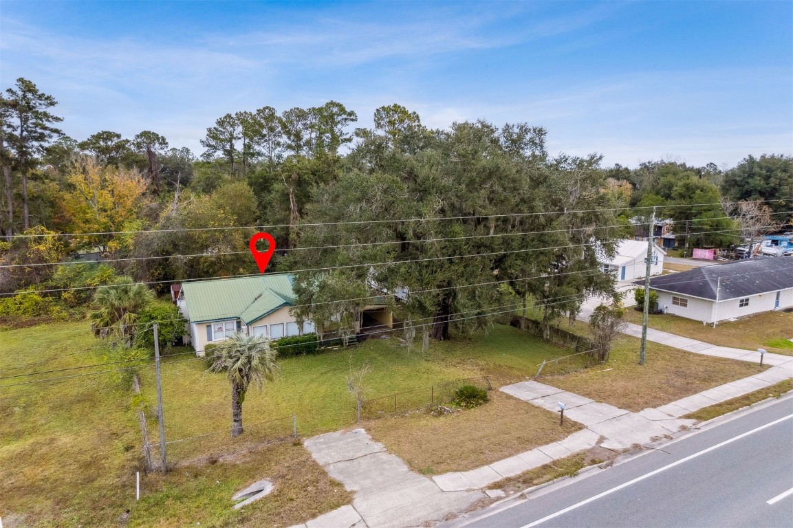463465 State Road 200 Yulee, FL 32097 - Photo 14 of 20 a view of a lake with a house