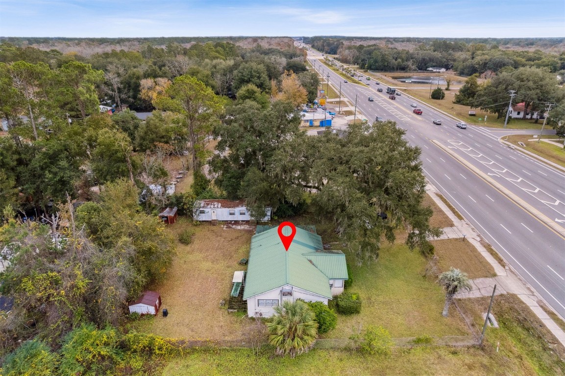463465 State Road 200 Yulee, FL 32097 - Photo 15 of 20 an aerial view of house with yard and mountain view in back