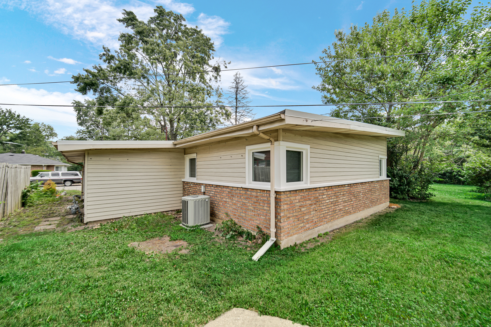 263 Sangamon Street Park Forest, IL 60466 - Photo 16 of 17 a view of a house with a yard
