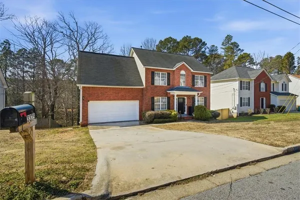 a front view of house with yard