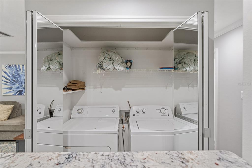 19660 Southwest 83rd Place Road, Unit C13 Dunnellon, FL 34432 - Photo 27 of 52 a bathroom with a tub sink and mirror