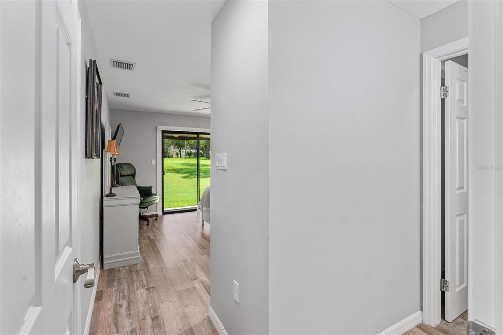 19660 Southwest 83rd Place Road, Unit C13 Dunnellon, FL 34432 - Photo 30 of 52 a view of a hallway view with wooden floor and closet