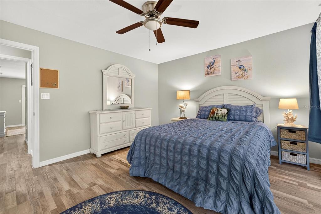 19660 Southwest 83rd Place Road, Unit C13 Dunnellon, FL 34432 - Photo 39 of 52 a bedroom with a bed and a dresser