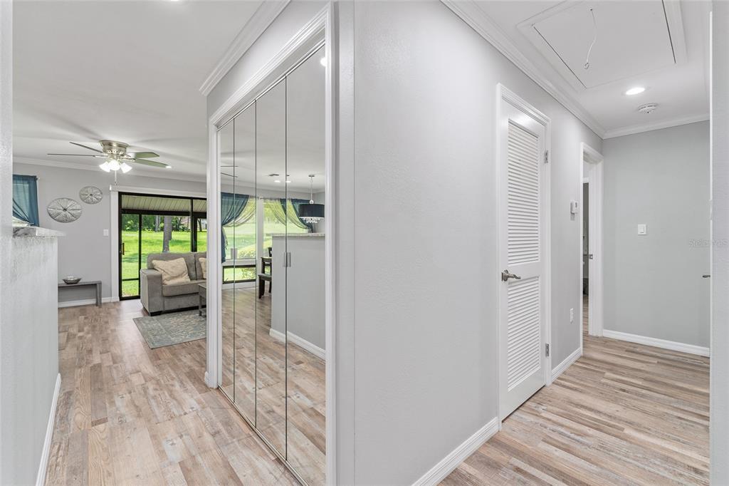 19660 Southwest 83rd Place Road, Unit C13 Dunnellon, FL 34432 - Photo 6 of 52 a view of a hallway view with staircase and a living room