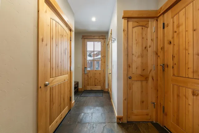 a hallway with washer and dryer