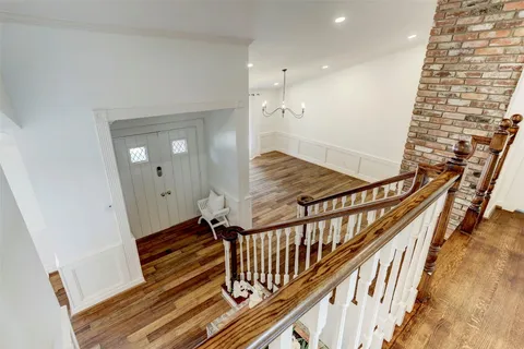 a view of entryway with wooden floor