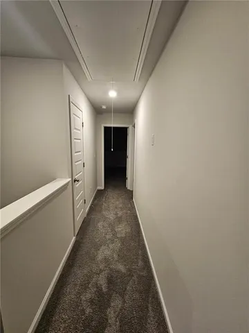 a view of hallway with stairs