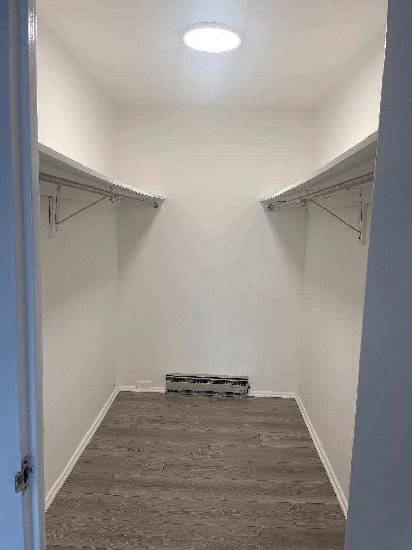 3801 Appian Way, Unit 302 Glenview, IL 60025 - Photo 9 of 16 a view of a room with wooden floor