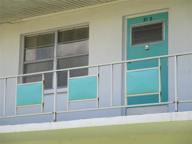 a view of an entrance and a room