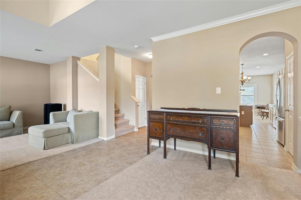 2603 White Stallion Way Leander, TX 78641 - Photo 7 of 38 a living room with furniture and a wooden floor