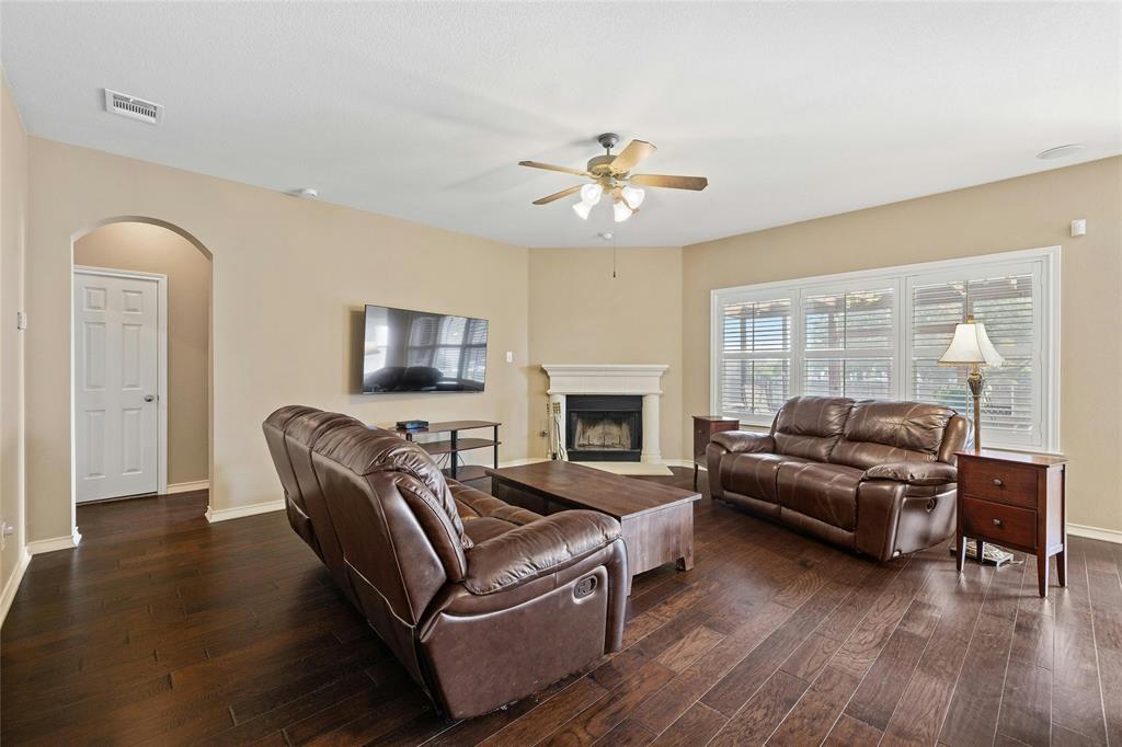 2603 White Stallion Way Leander, TX 78641 - Photo 8 of 38 a living room with furniture fireplace and flat screen tv