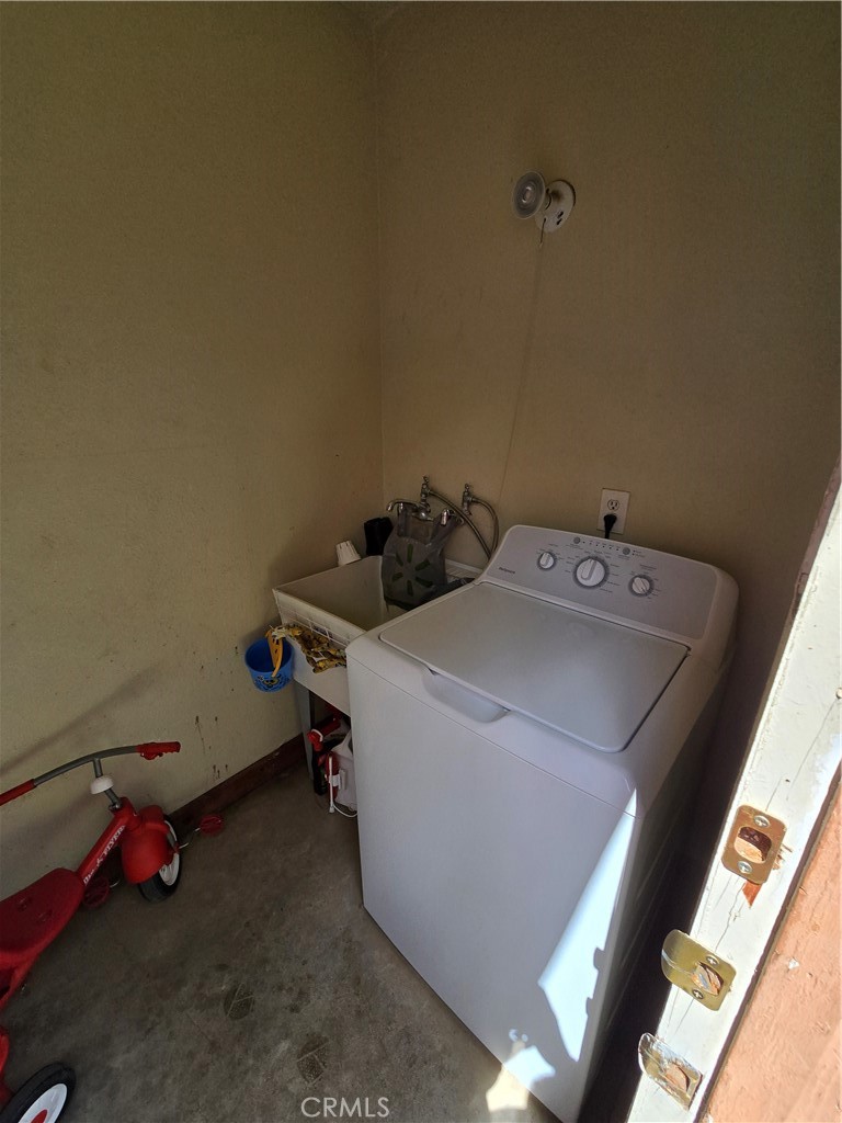 7457 Mt Vernon Street Riverside, CA 92504 - Photo 15 of 23 a utility room with dryer and washer