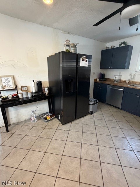 1148 Riverside Avenue Wellsville, OH 43968 - Photo 4 of 14 Kitchen featuring black fridge with ice dispenser, dishwasher, butcher block countertops, a ceiling fan, and a textured ceiling