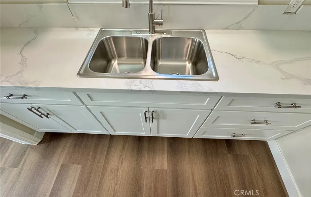 3402 Gaviota Avenue, Unit B Long Beach, CA 90807 - Photo 9 of 22 a close view of sink and tap