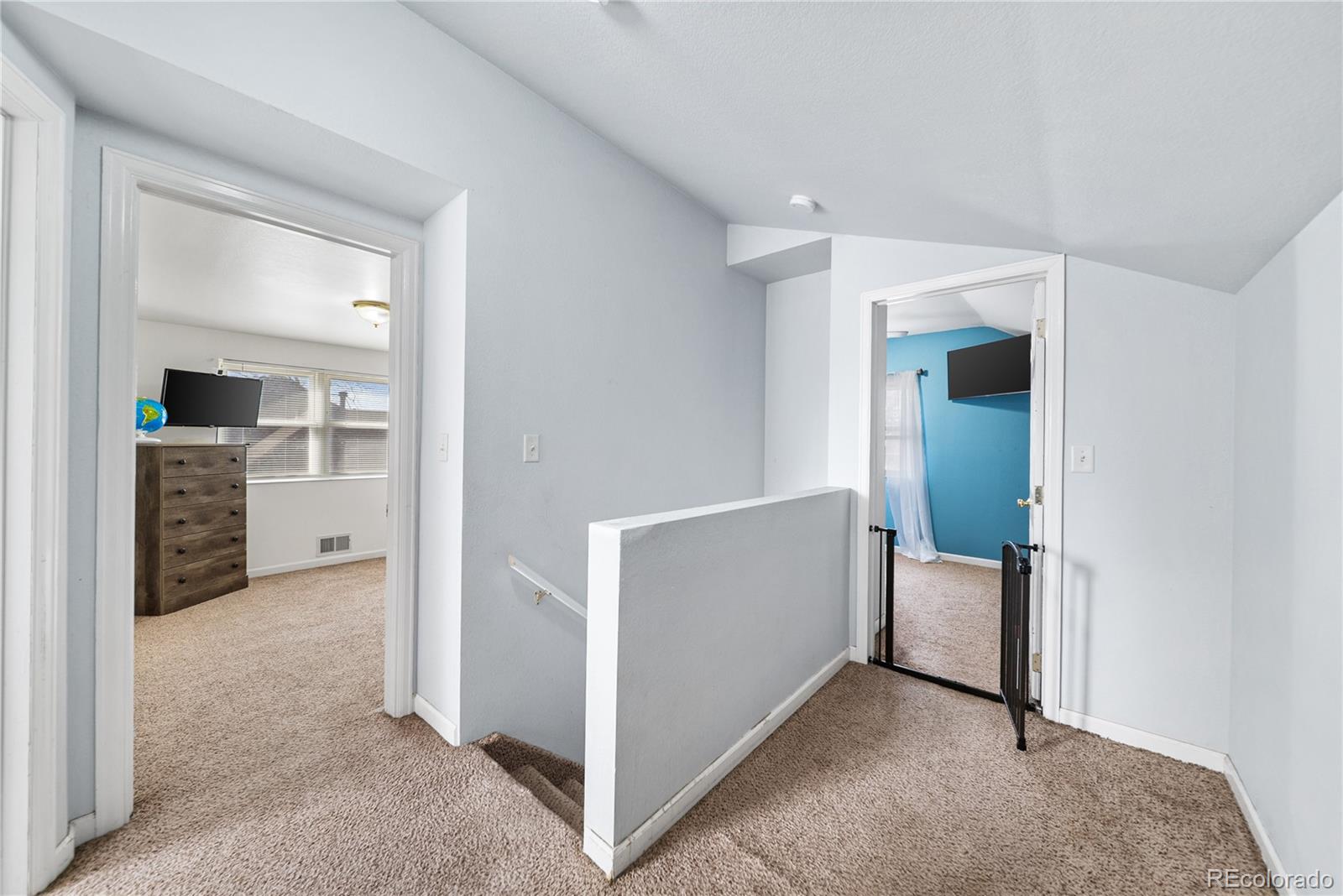 550 Custer Avenue Akron, CO 80720 - Photo 22 of 35 an entryway with a cabinet and a rug