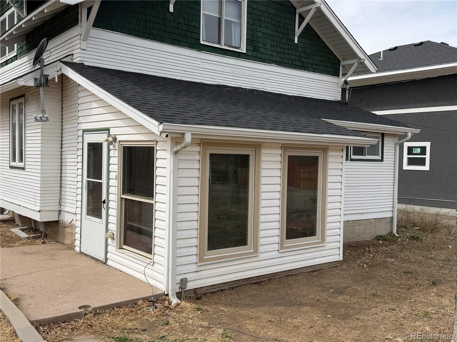 550 Custer Avenue Akron, CO 80720 - Photo 29 of 35 a view of the house and small yard