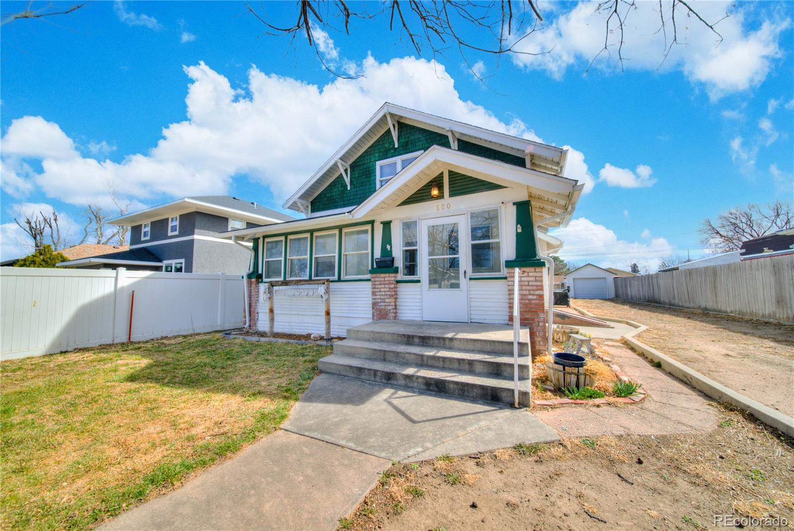 550 Custer Avenue Akron, CO 80720 - Photo 4 of 35 a view of a house with a park