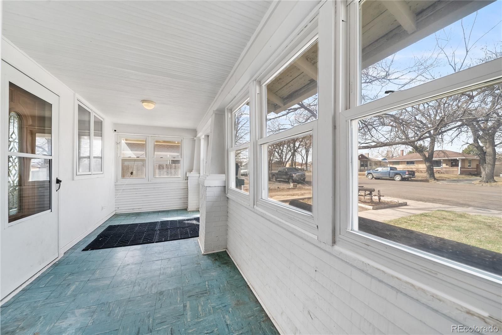 550 Custer Avenue Akron, CO 80720 - Photo 7 of 35 a view of an empty room with a window