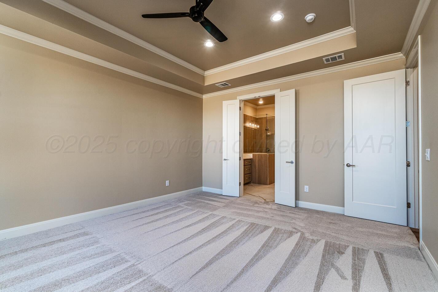 6304 Lauren Ashleigh Drive Amarillo, TX 79119 - Photo 17 of 38 a view of a livingroom with a ceiling fan and entryway