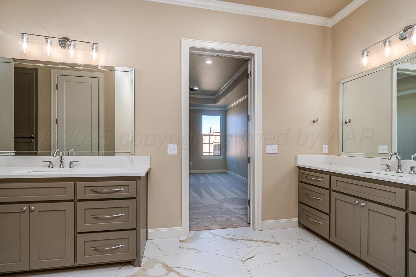 6304 Lauren Ashleigh Drive Amarillo, TX 79119 - Photo 18 of 38 a bathroom with a double vanity sink mirror and double
