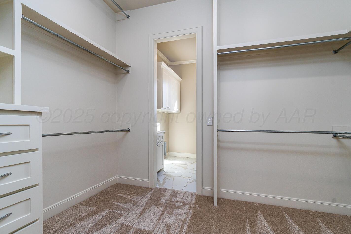 6304 Lauren Ashleigh Drive Amarillo, TX 79119 - Photo 23 of 38 a view of an empty walk in closet