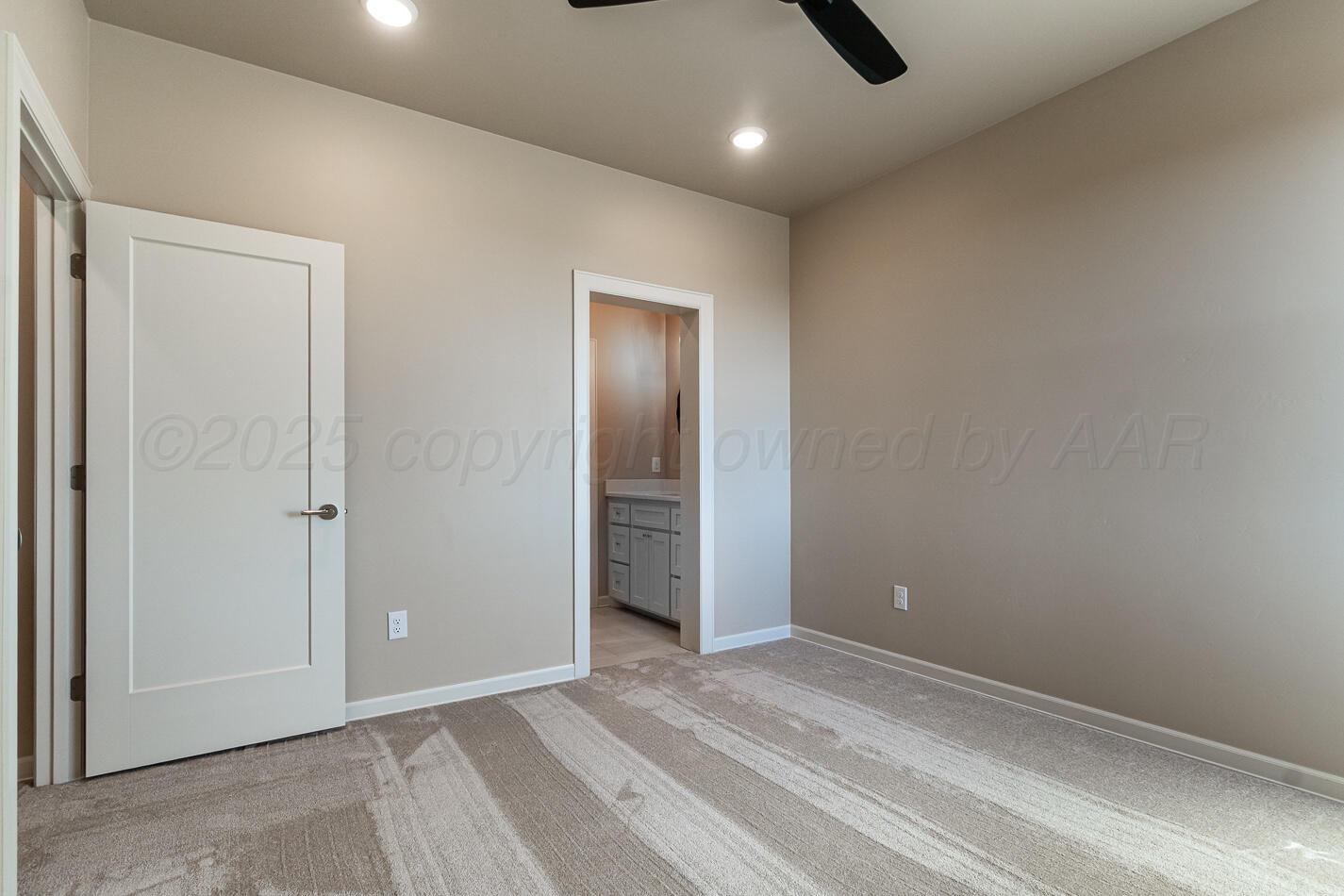 6304 Lauren Ashleigh Drive Amarillo, TX 79119 - Photo 32 of 38 an empty room with an entryway