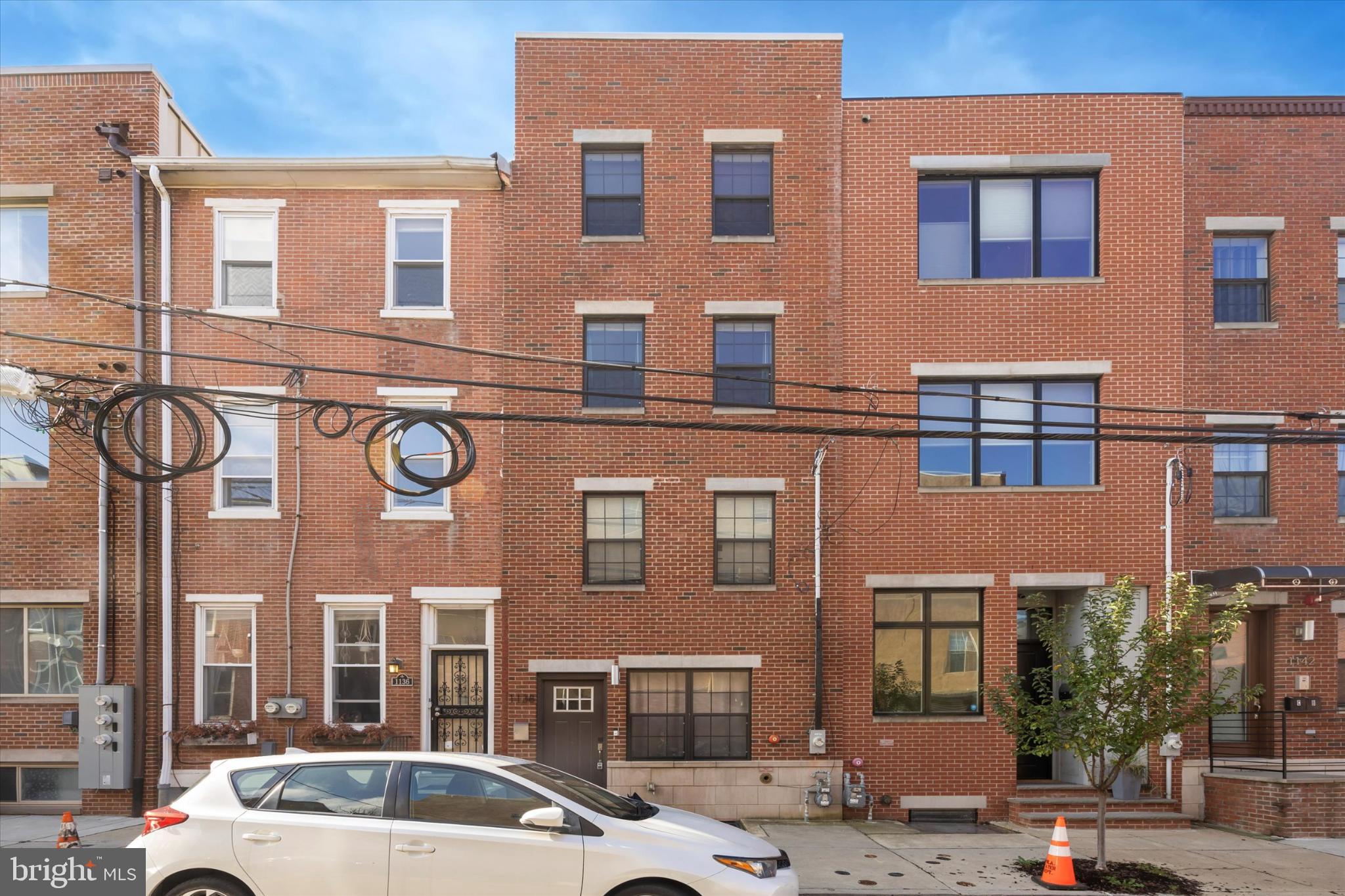 1138 Mt Vernon Street Philadelphia, PA 19123 - Photo 1 of 25 a front view of a building with parking space