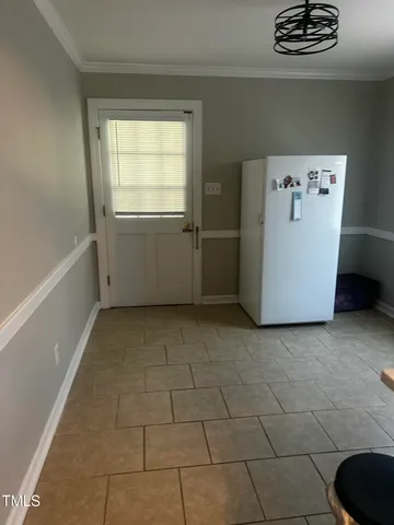 a view of storage and utility room with washer and dryer