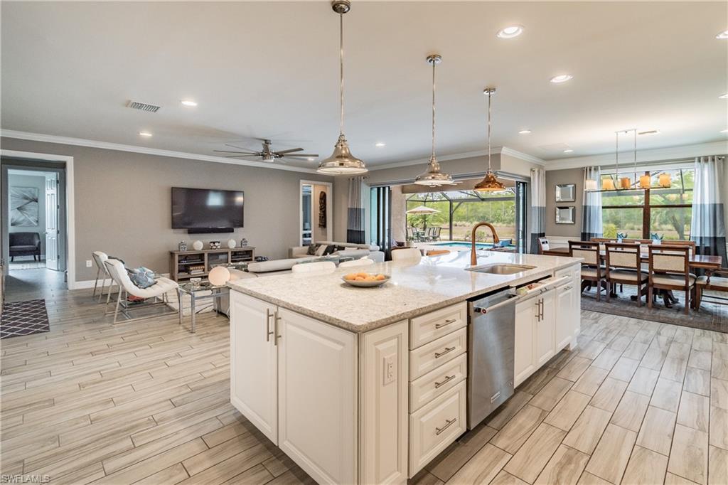 7247 Clamshell Lane Naples, FL 34114 - Photo 13 of 33 a kitchen with lots of counter top space