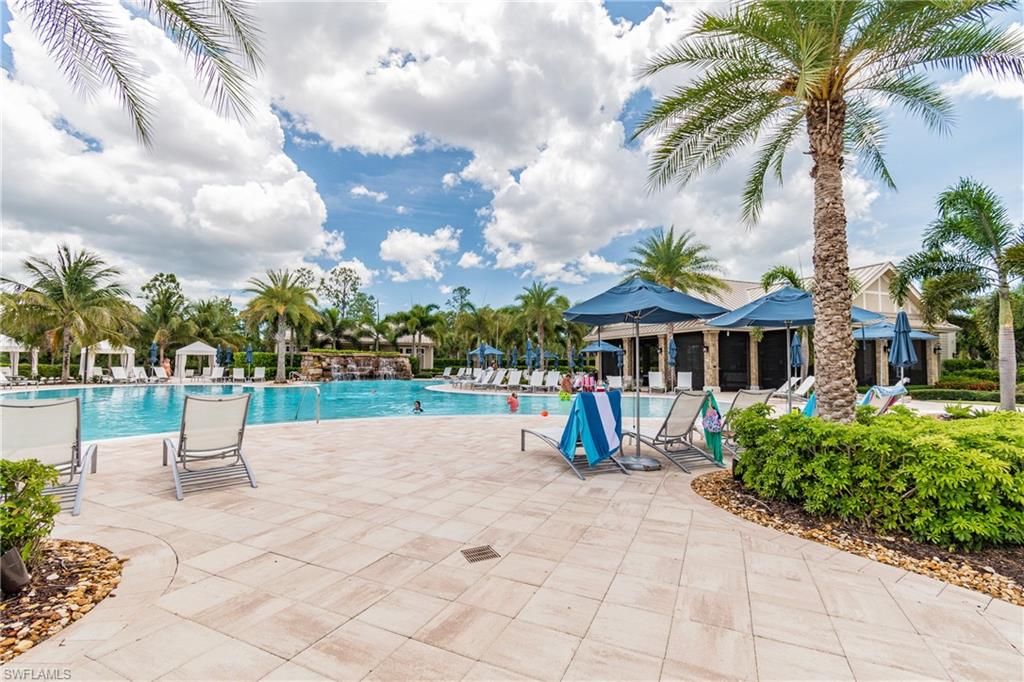 7247 Clamshell Lane Naples, FL 34114 - Photo 27 of 33 a view of a house with a yard