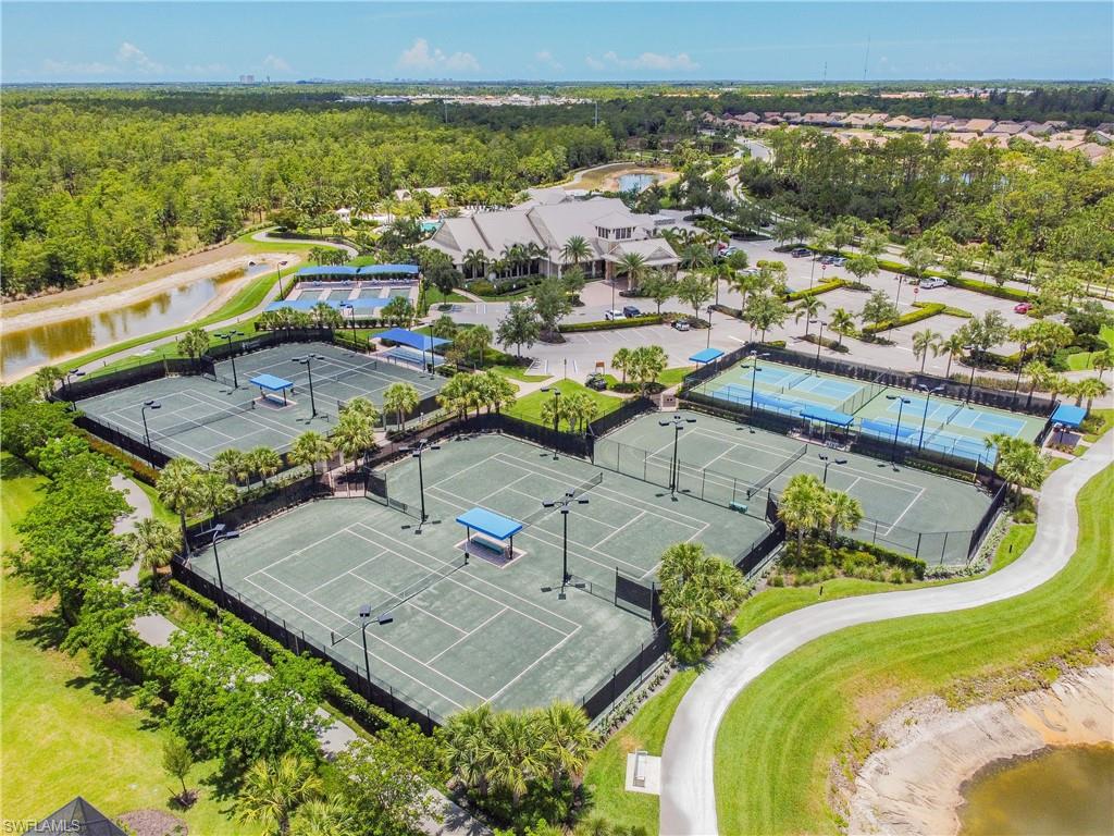 7247 Clamshell Lane Naples, FL 34114 - Photo 28 of 33 an aerial view of residential houses with outdoor space