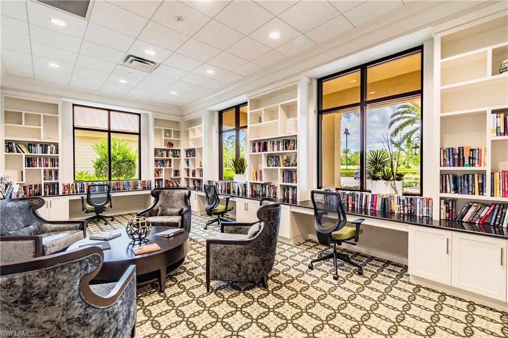 7247 Clamshell Lane Naples, FL 34114 - Photo 30 of 33 a room with furniture and large windows